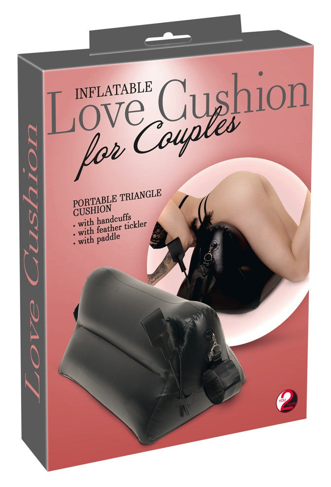 Love pillow with handcuffs and whip for erotic games for couples
